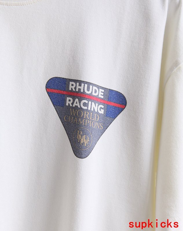 Flat lay presentation of Rhude luxury clothing with monogram-inspired silhouette