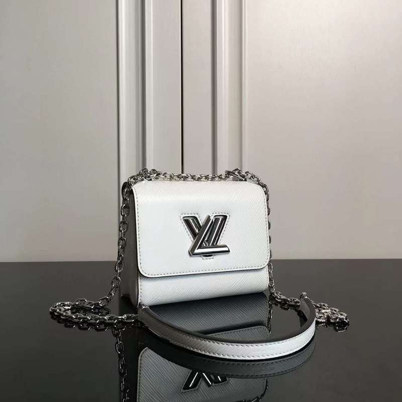 Close-up detail of structured polished women's handbag – women's statement bag