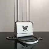 Close-up detail of structured polished women's handbag – women's statement bag