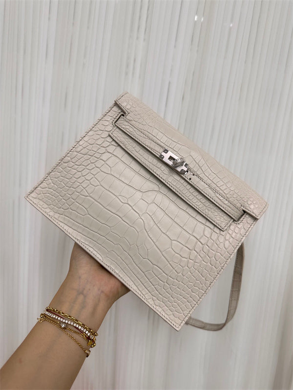 Side view of sculpted structured handbag