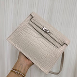 Side view of sculpted structured handbag