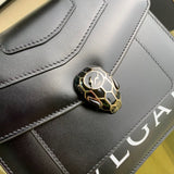 Refined Faux Leather Handbag - Refined Silhouette | Women's Statement Accessory #1707 - styled full view (image 7) of designer-inspired handbag