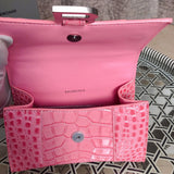 Side profile of structured classic women's handbag – women's luxury handbag