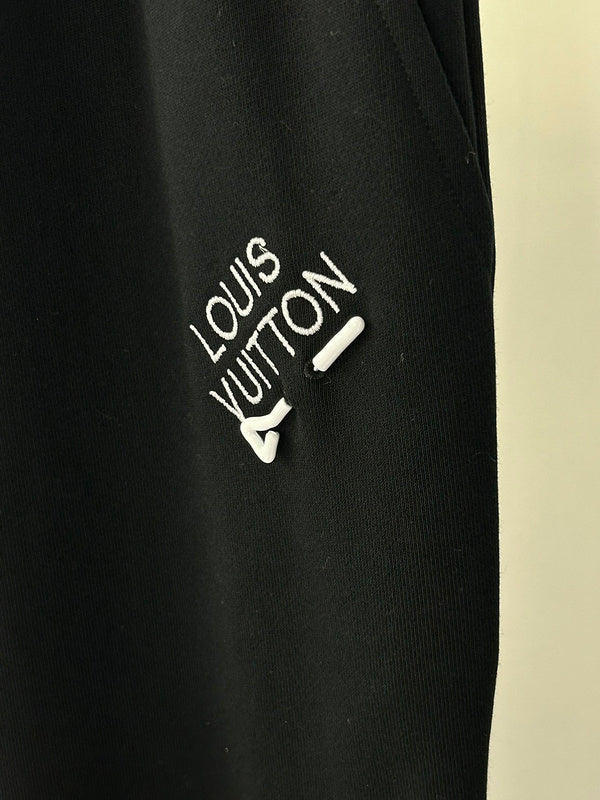Front view of Louis Vuitton luxury clothing with contemporary cut