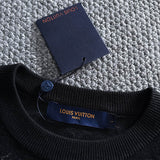 Front view of Louis Vuitton luxury clothing with logo-detail design