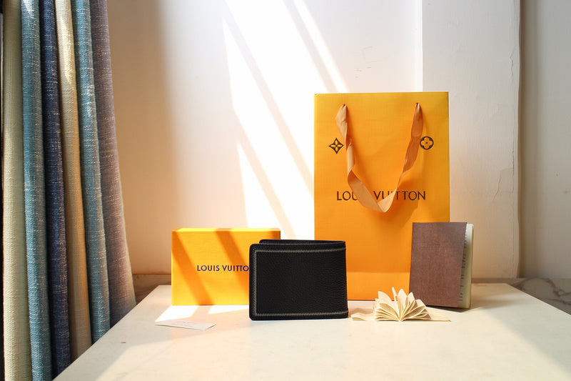 Front view of signature sleek women's handbag – women's luxury accessory