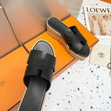 Hermès Tan Flat Thong Sandals - Lifestyle Styling Shot