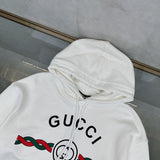 Side profile of Gucci luxury clothing with logo-detail design