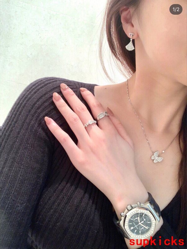 Lifestyle view of Van Cleef & Arpels unisex jewelry piece