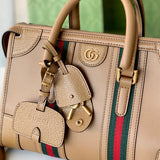 Side profile of statement polished women's handbag – women's everyday handbag