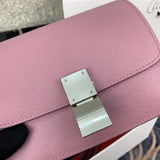 Handle and strap detail of structured polished women's handbag – women's luxury handbag