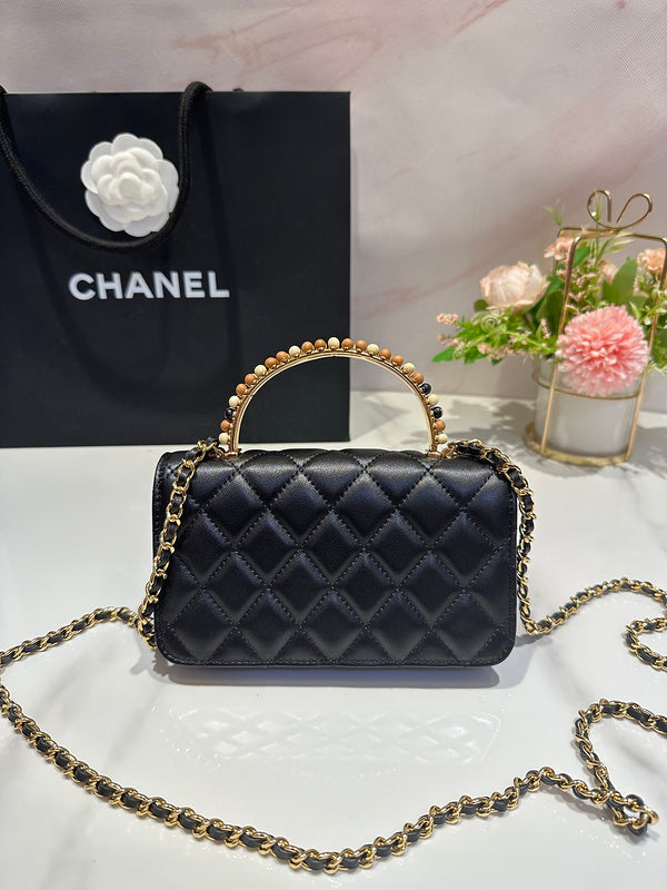 Ziva's Charm handbag – side angle view (one versatile size)
