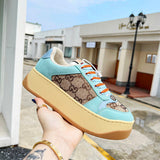 Gucci Casual sneakers in classic monochrome retro runner design front view