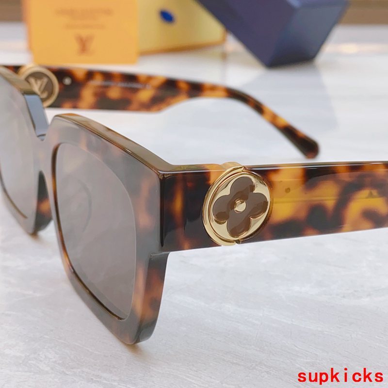 Close-up detail view of Louis Vuitton unisex sunglasses