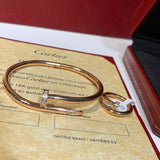 Angled view of Cartier unisex jewelry piece