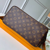 Side profile of elevated signature women's handbag – women's luxury accessory