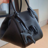  sleek tote bag styled with outfit