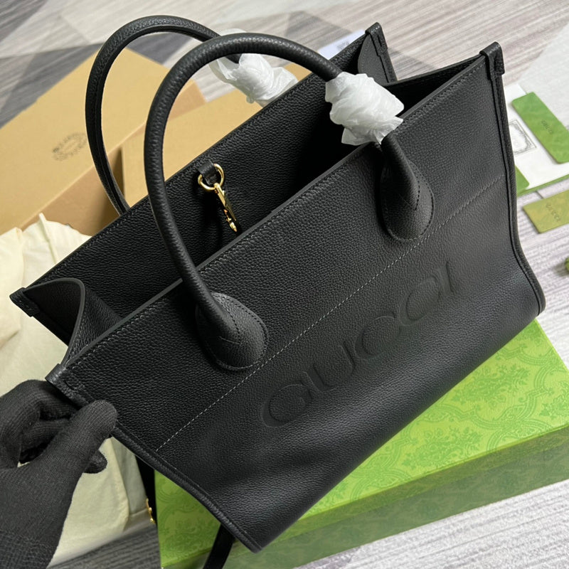Handle and strap detail of structured chic women's handbag – women's designer-style accessory