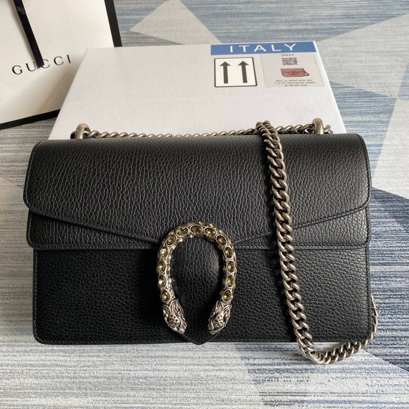 Side profile of statement signature women's handbag – women's statement bag