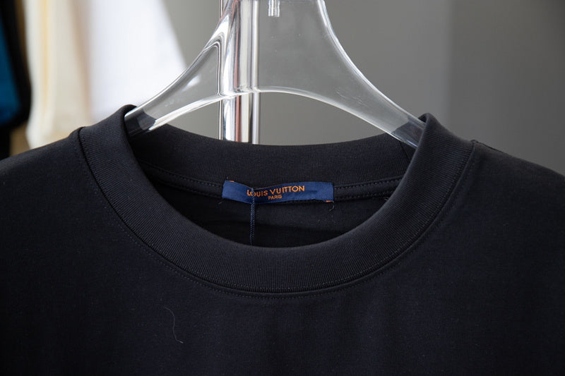 Close-up detail shot of Louis Vuitton cotton t-shirt with monogram-inspired silhouette