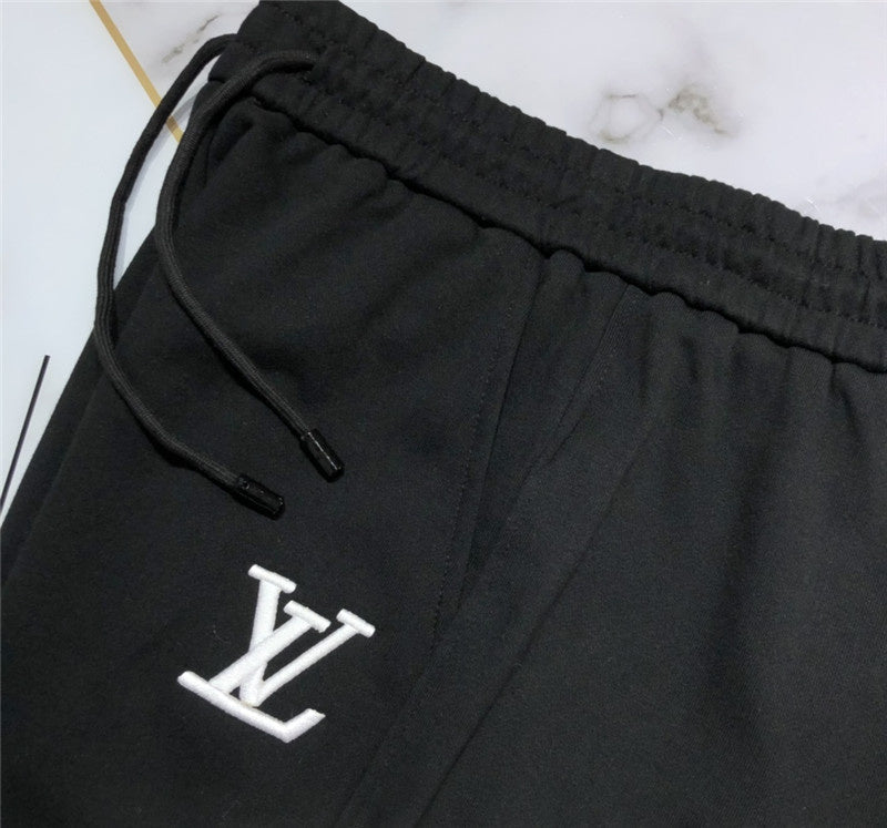 Close-up detail shot of Louis Vuitton cotton t-shirt with label-forward styling
