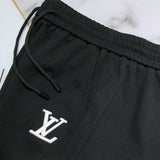 Close-up detail shot of Louis Vuitton cotton t-shirt with label-forward styling