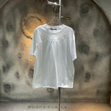 Back view of Louis Vuitton cotton t-shirt with runway-inspired design