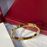 Close-up detail view of Cartier unisex jewelry piece