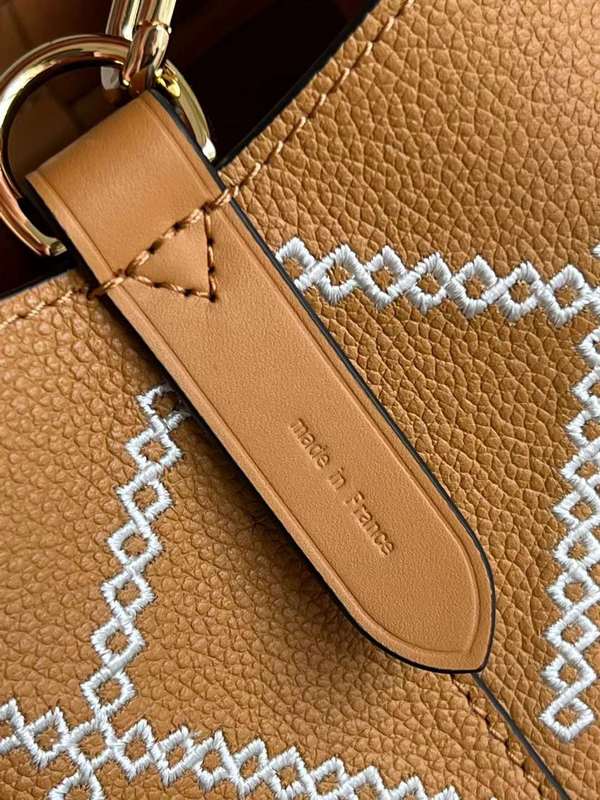 Front view of structured polished women's handbag – women's everyday handbag