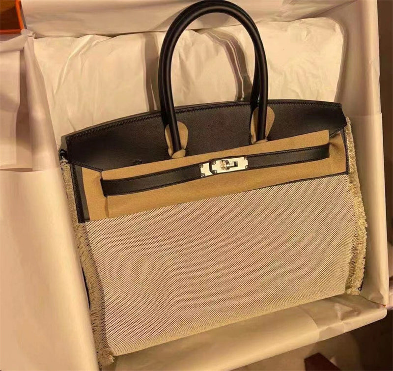 Fluid bag women's premium everyday handbag