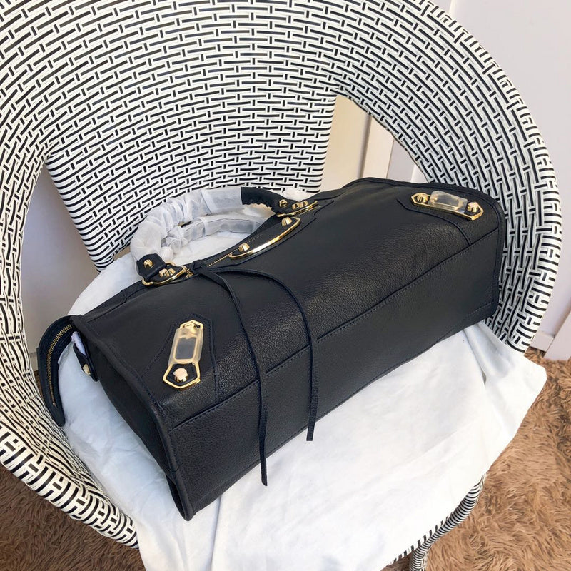 Styled lifestyle shot of structured premium women's handbag – women's everyday handbag