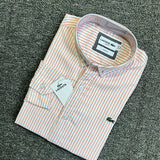 Flat lay presentation of Lacoste luxury clothing with logo-detail design