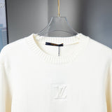 Back view of Louis Vuitton luxury clothing with signature branding