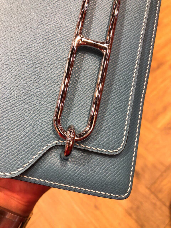 Side view of timeless structured handbag