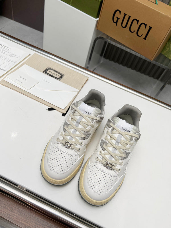 Gucci crisp white luxury sneakers view 5 retro runner design