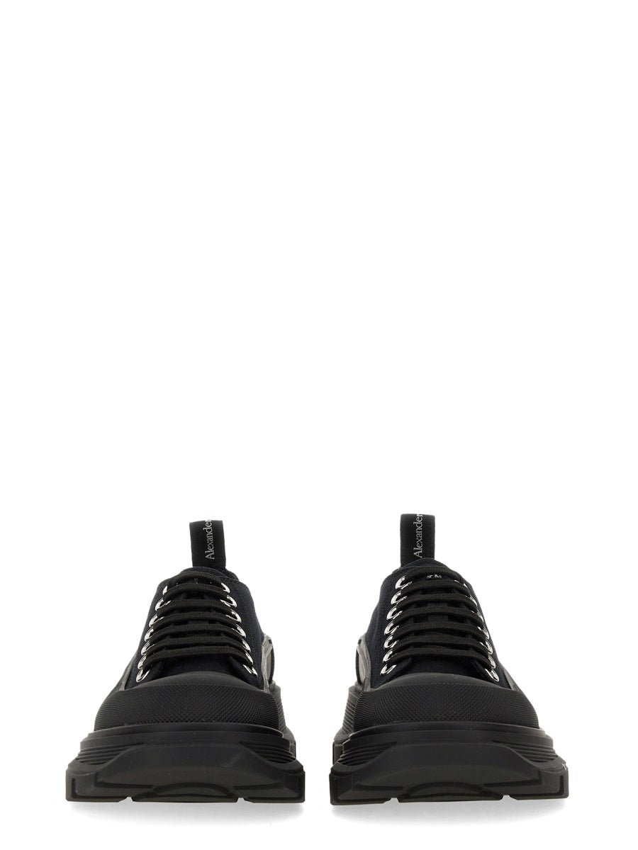 Close-up of Alexander McQueen athletic hardware and fine stitching