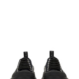 Close-up of Alexander McQueen athletic hardware and fine stitching