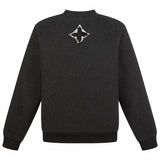 Side profile of Louis Vuitton luxury clothing with signature branding