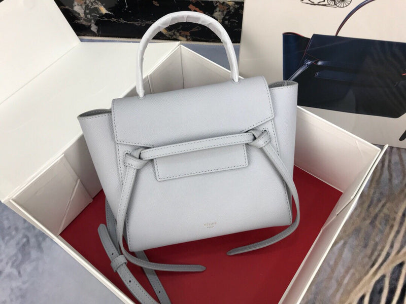 Side profile of signature statement women's handbag – women's everyday handbag