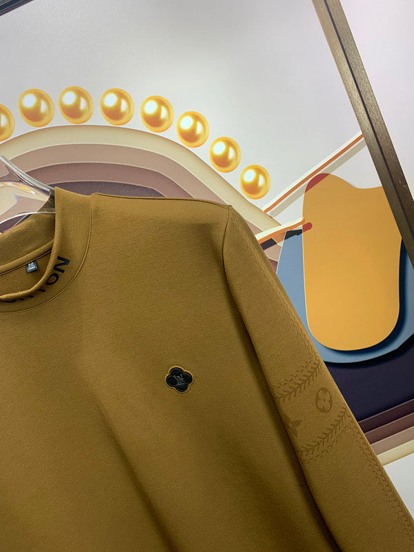 Full styled look of Louis Vuitton luxury clothing with monogram-inspired silhouette