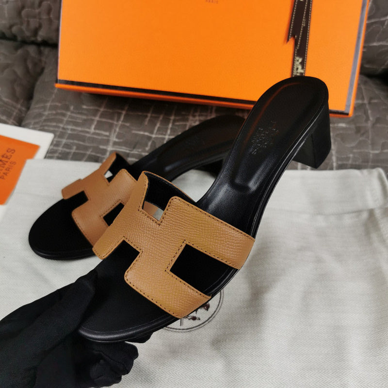 Hermès Grey Slide Sandals - Close-Up Texture View
