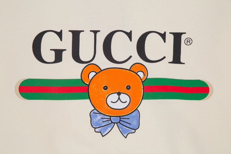 Flat lay presentation of Gucci luxury clothing with everyday silhouette