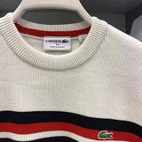 Back view of Lacoste luxury clothing with monogram-inspired silhouette