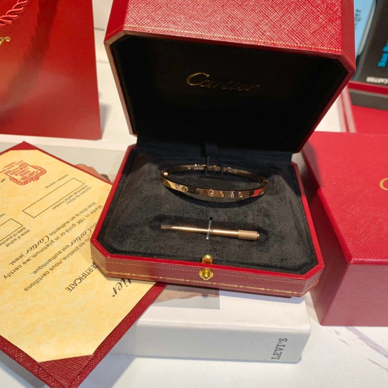 Close-up detail view of Cartier unisex jewelry piece
