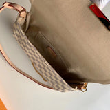 Close-up detail of classic polished women's handbag – women's luxury handbag