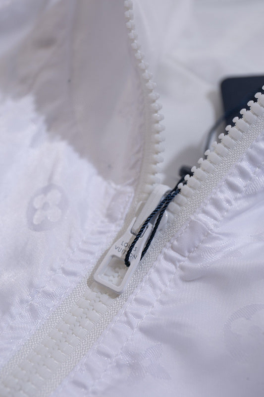 Front view of Louis Vuitton luxury clothing with label-forward styling