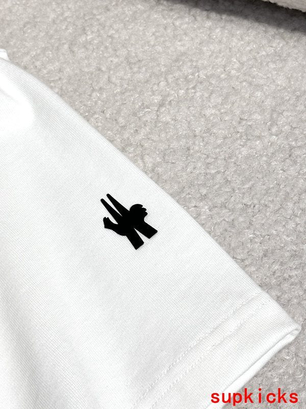 Full styled look of Moncler luxury clothing with signature branding