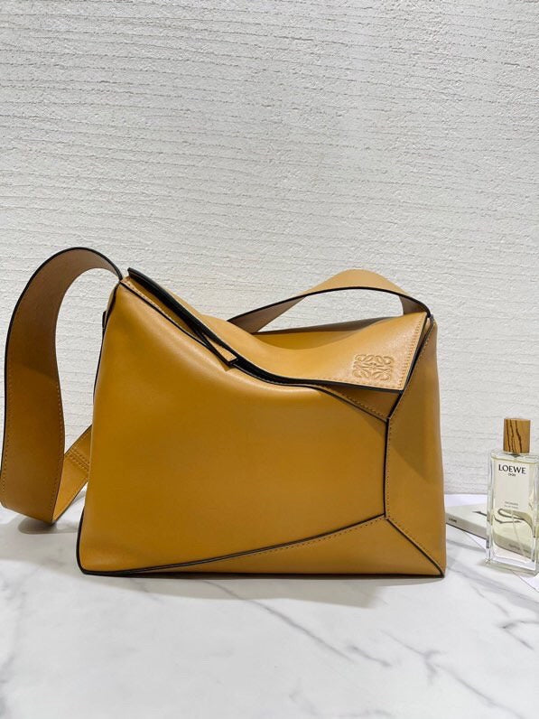 Ziva's Charm handbag – angled view (33.5cm*16.5cm*24cm)