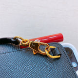 Side view of balanced structured handbag