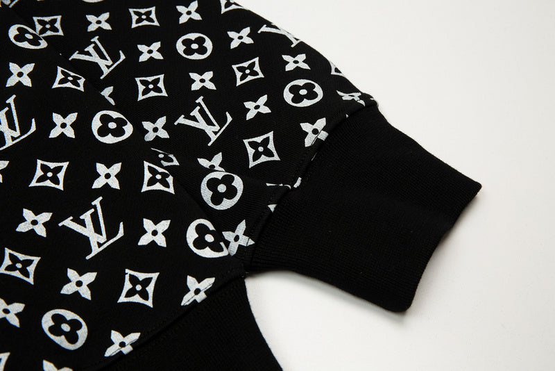 Close-up detail shot of Louis Vuitton luxury clothing with signature branding